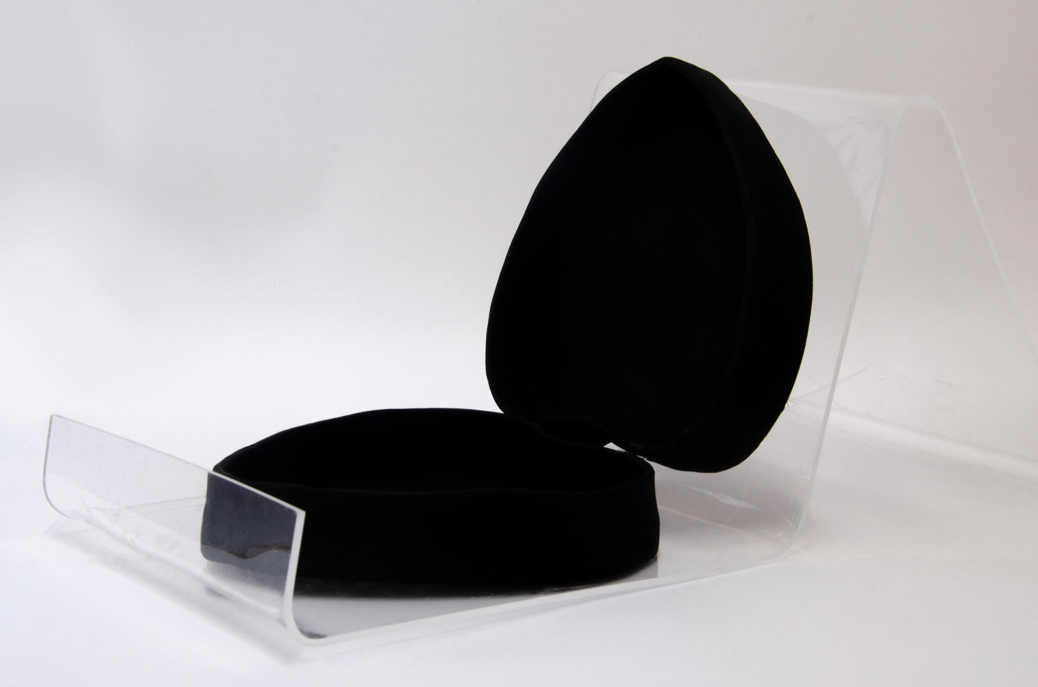 A heart shaped box painted with a deep matte black.